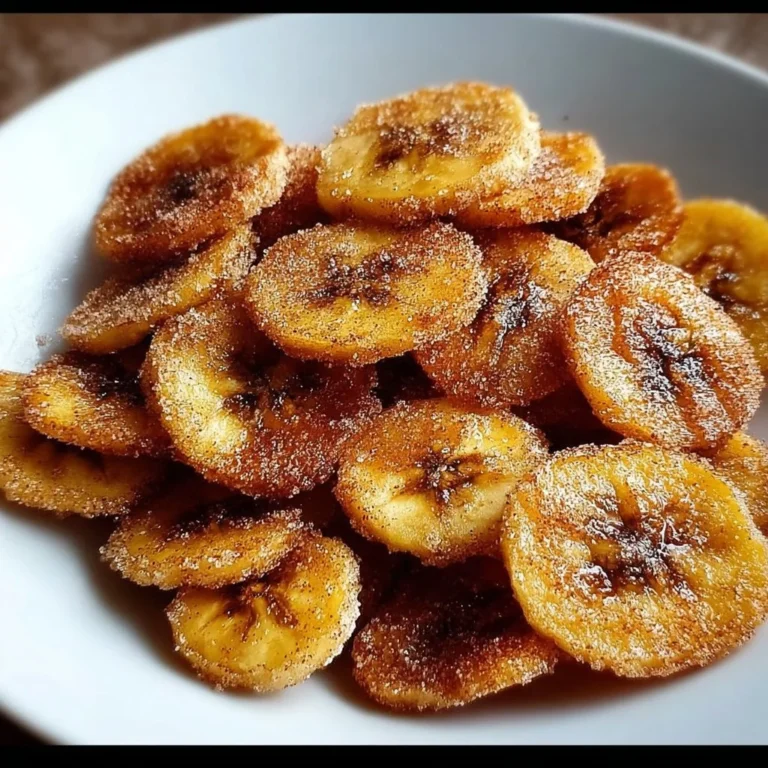 Delicious cinnamon-sugar air fryer banana chips ready to enjoy as a healthy snack.