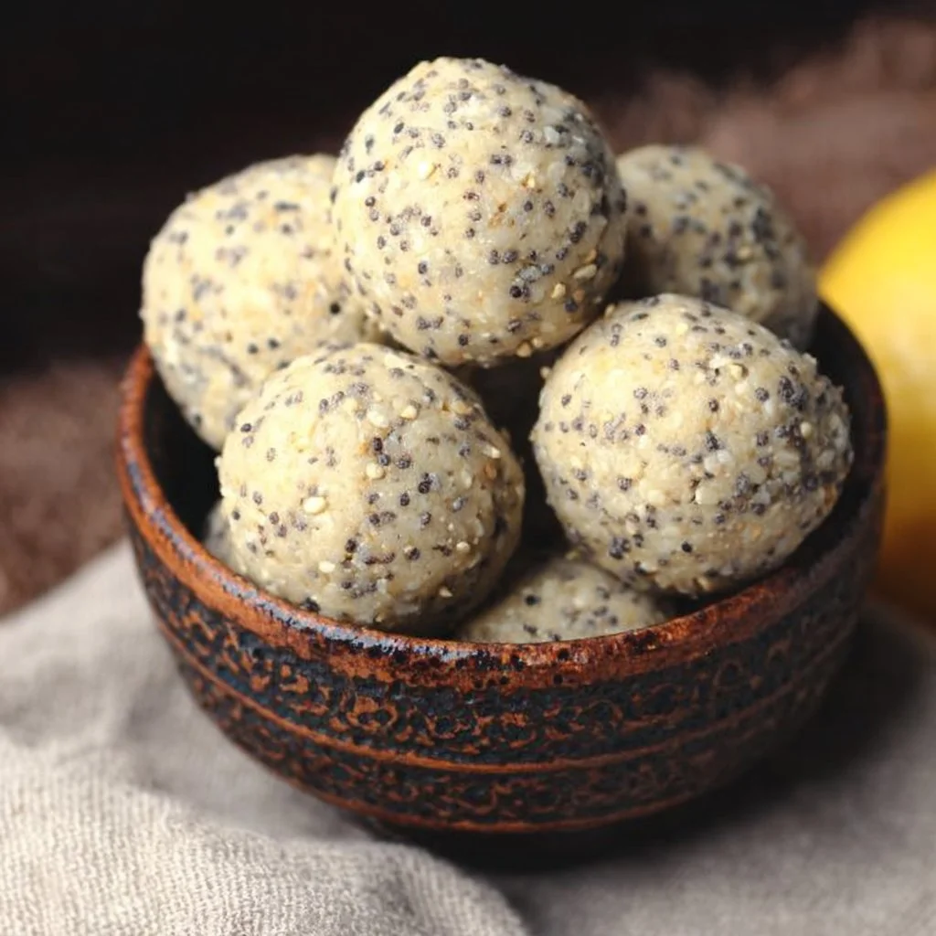 Healthy Lemon Poppy Seed Energy Bites on a white plate