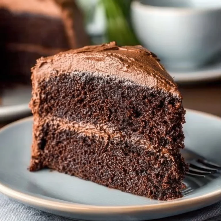 Delicious vegan chocolate cake garnished with berries and chocolate shavings