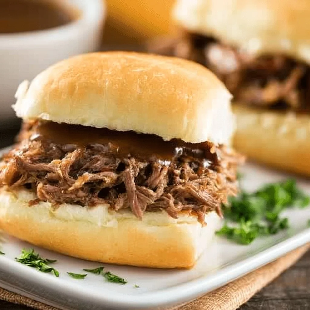 Delicious Easy Crock Pot French Dip served with au jus for dipping