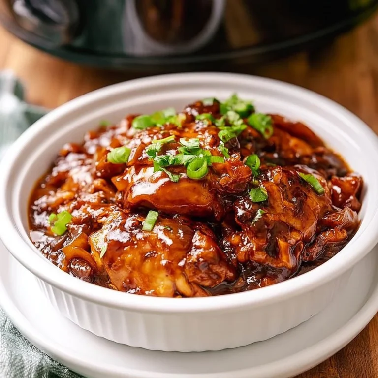 Delicious slow cooker honey garlic chicken served with garnishes